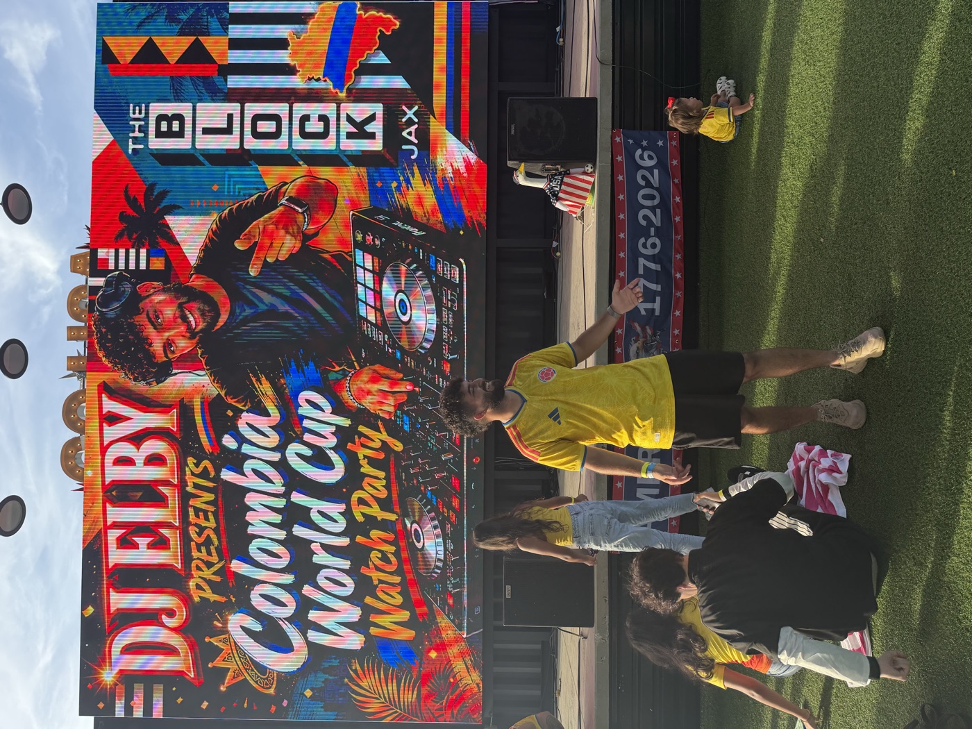 DJ Elby in front of the big screen at his Colombia World Cup watch party at The Block Jax